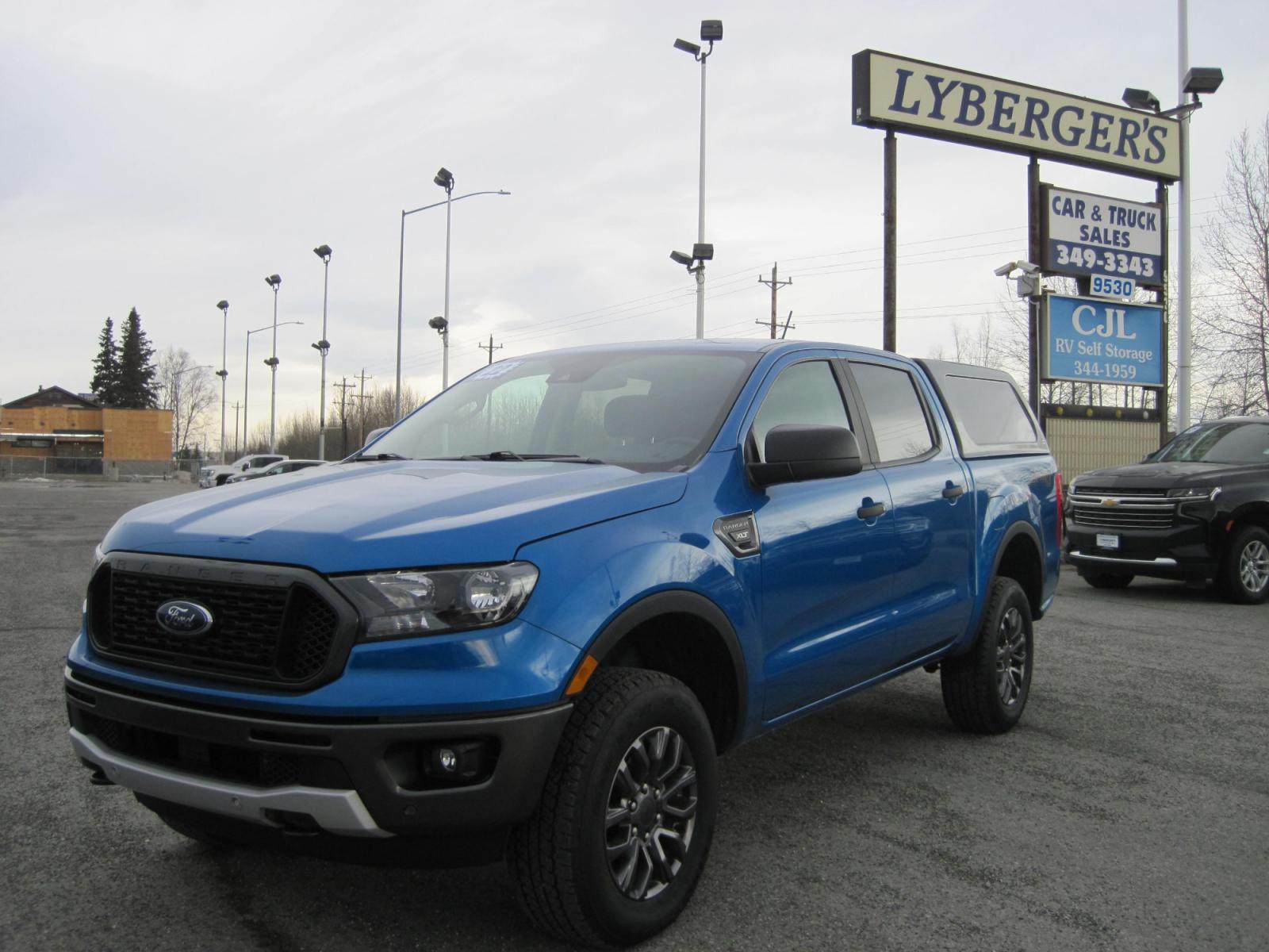2022 blue /black Ford Ranger XLT super crew (1FTER4FH8NL) , automatic transmission, located at 9530 Old Seward Highway, Anchorage, AK, 99515, (907) 349-3343, 61.134140, -149.865570 - Low Miles on this Ford Ranger XLT super crew come take a test drive. - Photo #1